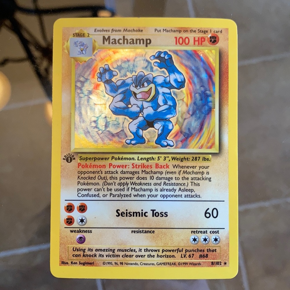 1st Edition Machamp Holographic Pokémon Card